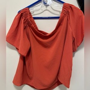Women’s off the shoulder blouse.